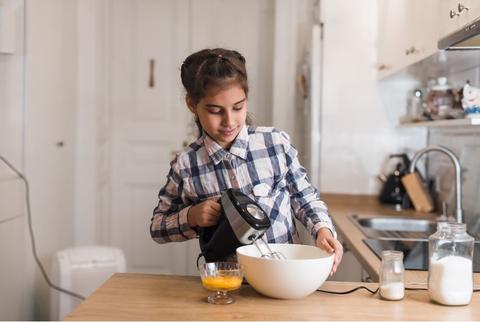 Girl cooking in the kitchen