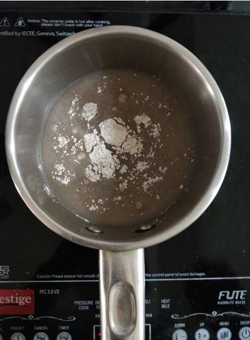 Add ragi powder to boiling water