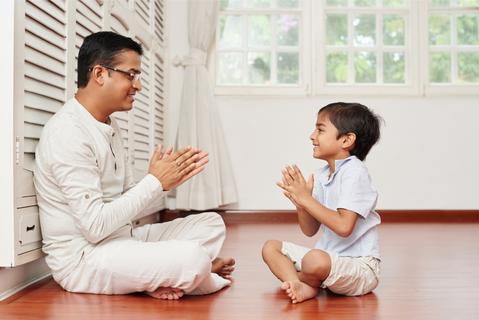 Positive Parenting Tips - A father teaching patience to his son