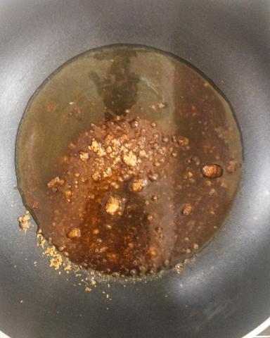 Jaggery, salt and water in a pan