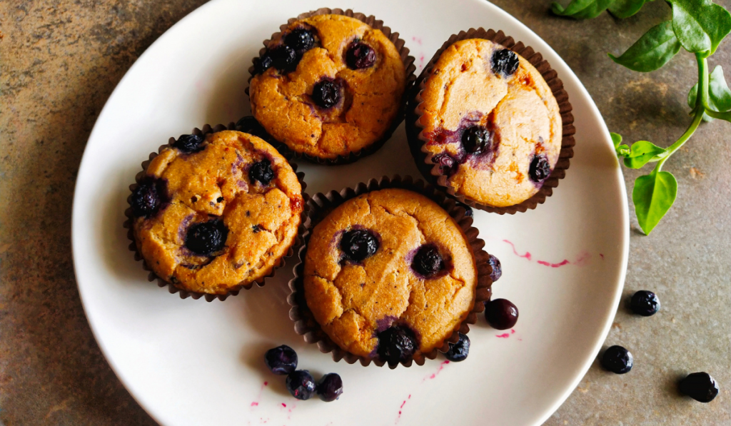 Blueberry muffins healthy kept on plate.
