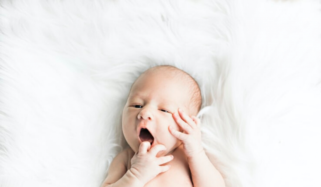 100 Modern Hindu Baby Names. Baby yawning.