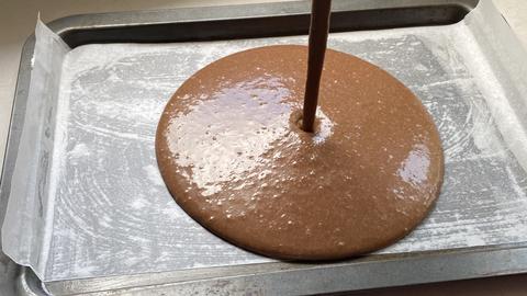 Pour the batter on a parchment paper