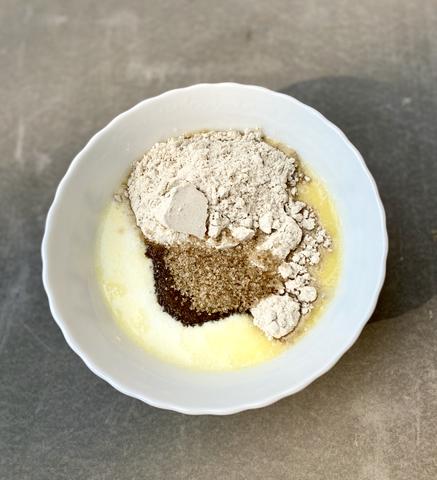 Bowl with raw unrefined sugar and vanilla cake mix
